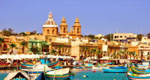 Harbour of Marsaxlokk village in Malta with colourful fishing boats