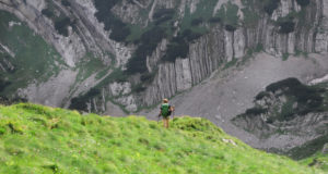 Young woman enjoying nature while hiking on Durmitor mountains, Montenegro