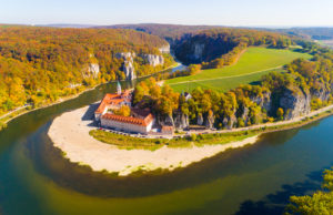 Aerial view to Weltenburg Abbey - Kloster Weltenburg. This landmark is a Benedictine monastery in Weltenburg in Kelheim on the Danube in Bavaria, Germany.