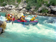 SOCA RIVER, SLOVENIA - JULY 8: White water rafting on the rapids of river Soca on July 8, 1998 in Triglav national park, Slovenia. Soca is one of the most beautiful rivers of Europe.