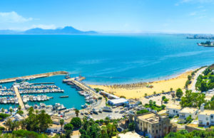 The scenic coastline of Sidi Bou Said with the large haven, full of yachts, Tunisia.