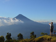 View of Volcan Agua near Antigua, Guatemala. Blue sky with some passing cloud