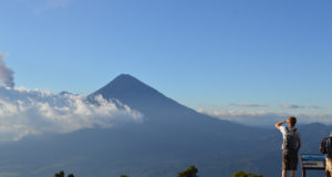 View of Volcan Agua near Antigua, Guatemala. Blue sky with some passing cloud