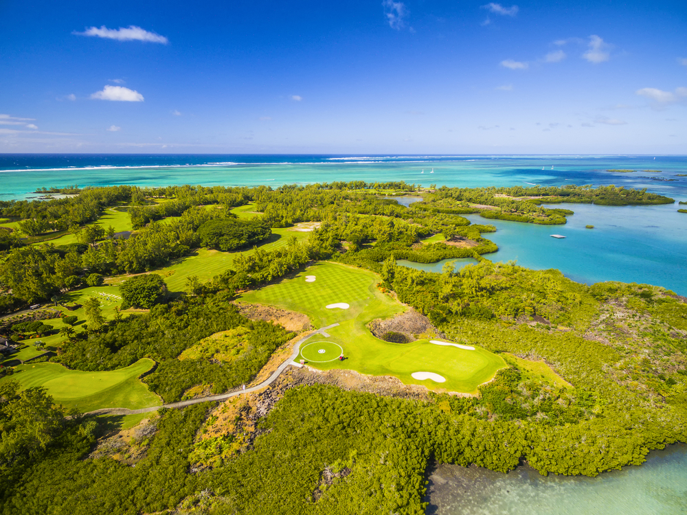 Mauritius beach aerial view of Ile Aux Cerf Beach island golf club on East Coast