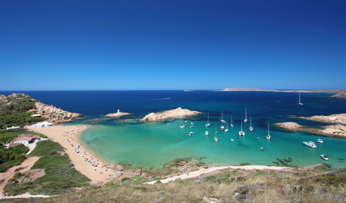 Main view of "Pregonda" beach, one of the most beautiful spots in Menorca, Balearic Islands, Spain.