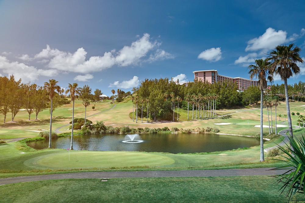 Golf green field in sunny day. Landscape of golf resort in Bredmuda island