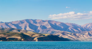 The view of Lake Charvak or reservoir with mountains in the background, Tashkent province, Uzbekistan