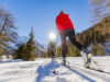 A family group of cross country skiers on a sunny winter morning in Italy Alps, South Tirol, Solda.