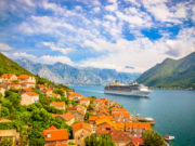 Beautiful mediterranean landscape. Cruise ship near town Perast, Kotor bay (Boka Kotorska), Montenegro.