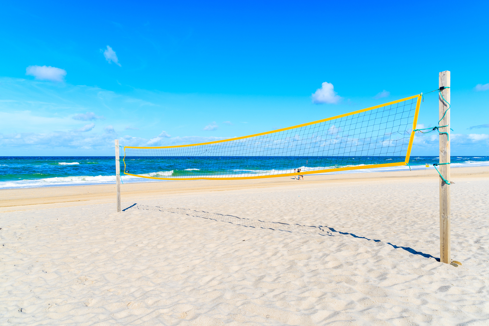 Volleyball net on sandy beach near Kampen village on Sylt island, North Sea, Germany