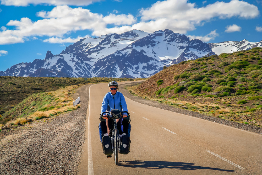 Woman cycling on the famous national Ruta 40 quarenta in central Argentina