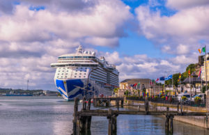 A sunny summer day in Ireland. On the foreground the original pier where passengers boarded tenders to the Titanic for it's last journey. September 2017 Cork, Ireland.